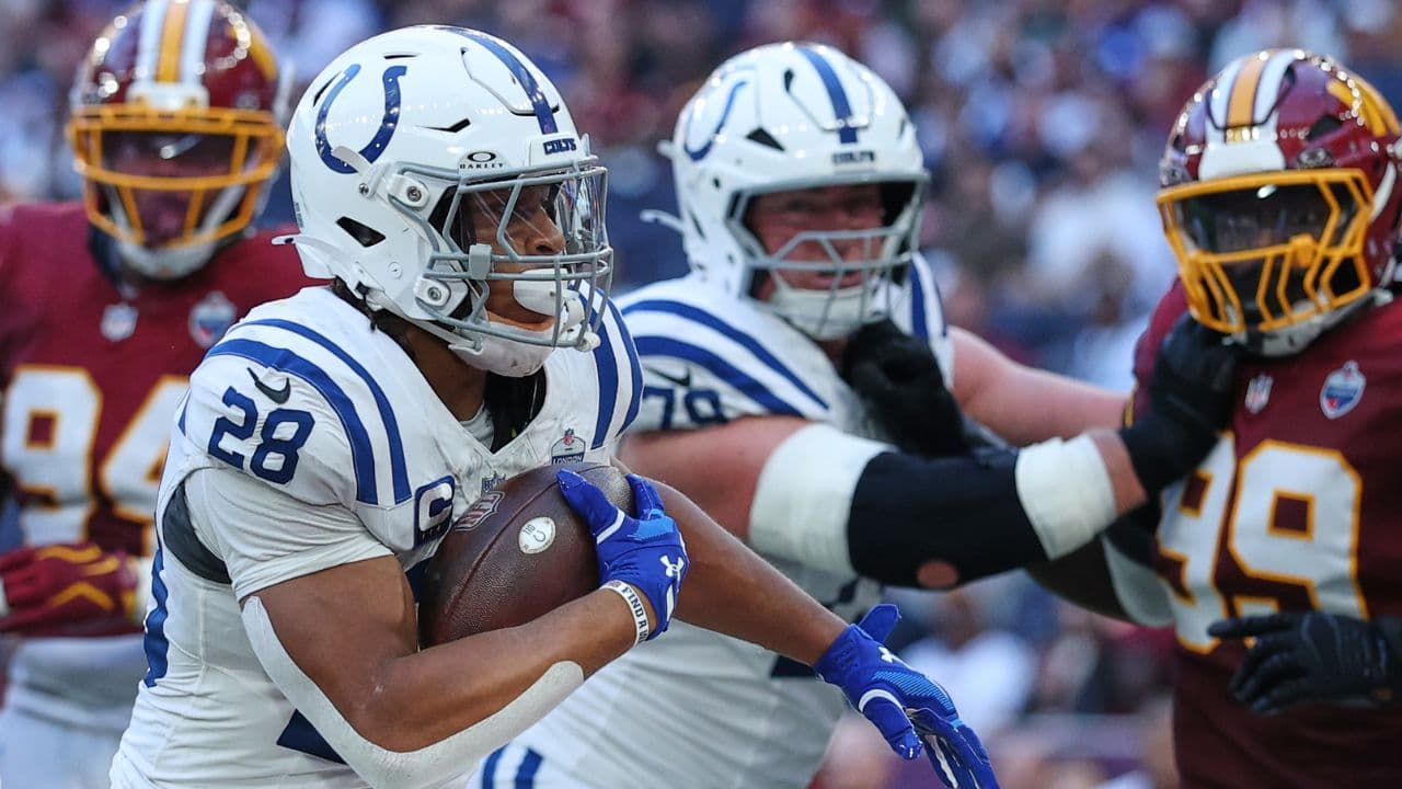 Taylor runs for two TDs as Colts beat Commanders in London