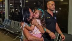 'Shaken and emotional' travellers arrive at Israeli airport